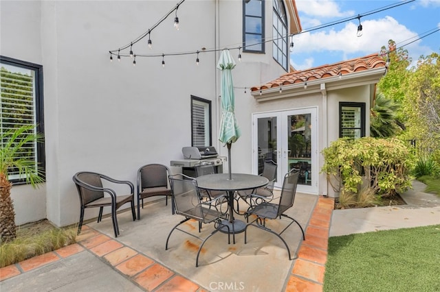 22544 N Summit Ridge Cir, Chatsworth, CA 91311 - view of patio / terrace with french doors, outdoor dining space, and a grill
