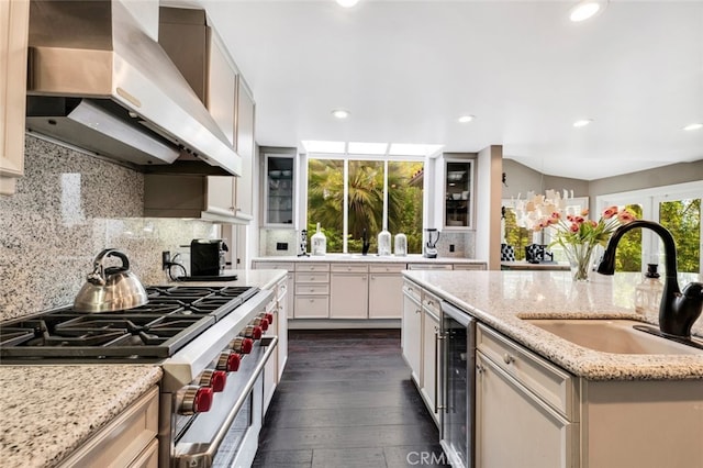 22544 N Summit Ridge Cir, Chatsworth, CA 91311 - kitchen featuring island range hood, high end stove, wine cooler, decorative backsplash, and recessed lighting