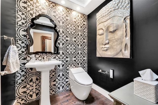 22544 N Summit Ridge Cir, Chatsworth, CA 91311 - half bathroom with wood finished floors and recessed lighting