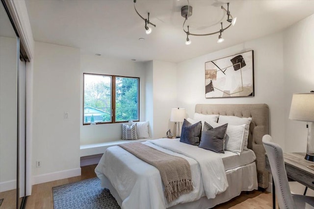 bedroom featuring light wood-type flooring