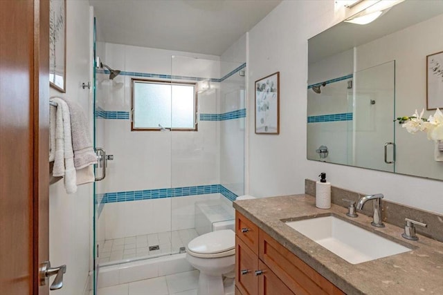 bathroom featuring walk in shower, vanity, and toilet