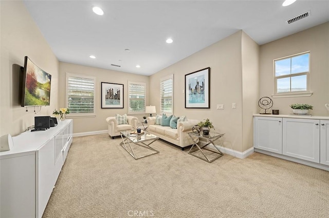 living room with light colored carpet