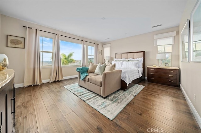 bedroom with wood-type flooring