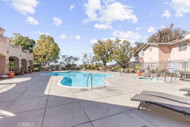 view of pool featuring a patio