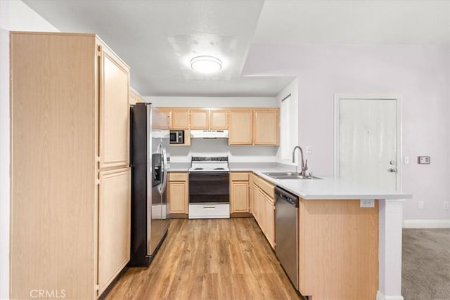 kitchen with sink, appliances with stainless steel finishes, light hardwood / wood-style floors, light brown cabinetry, and kitchen peninsula