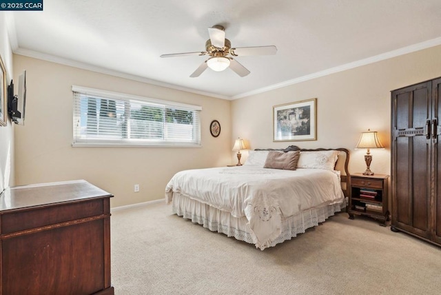 bedroom with light carpet, crown molding, and ceiling fan