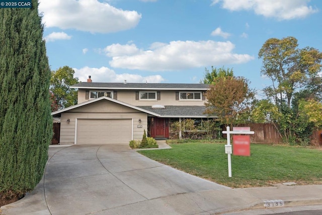 front of property with a garage and a front lawn