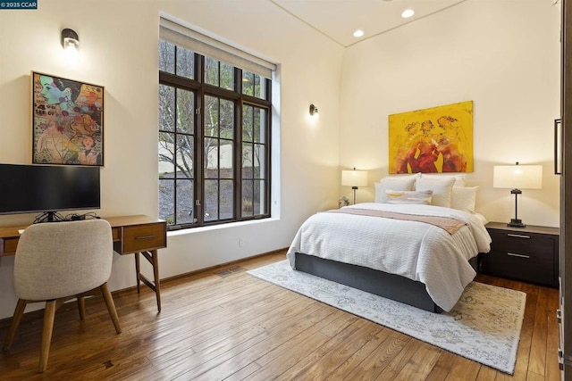 bedroom featuring light hardwood / wood-style floors