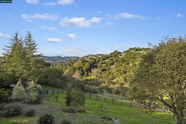 property view of mountains featuring a rural view