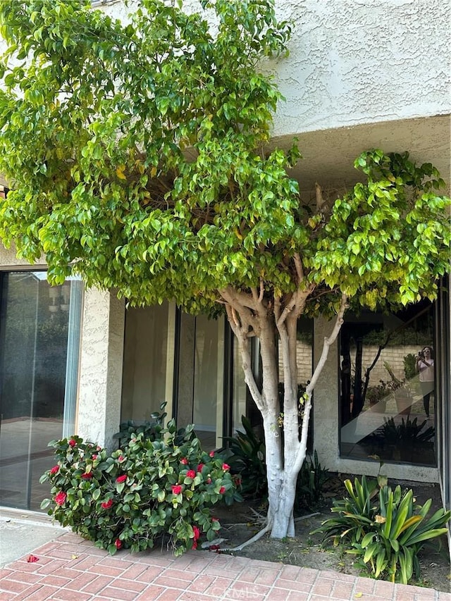 exterior space featuring stucco siding