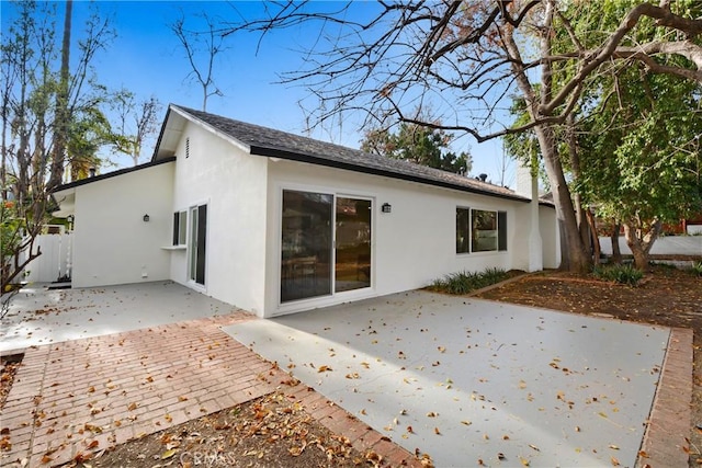 back of house featuring a patio