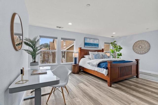 bedroom featuring hardwood / wood-style floors