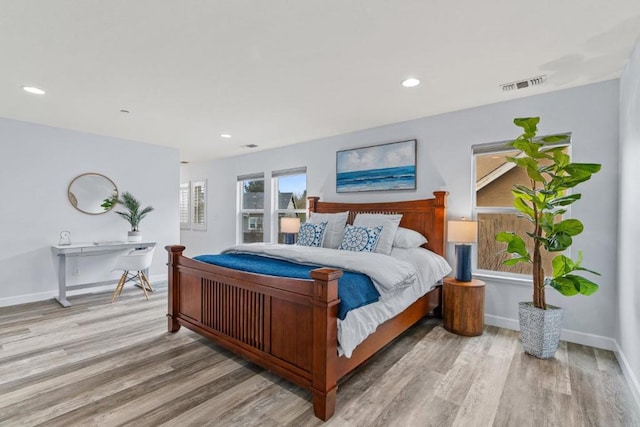 bedroom featuring light hardwood / wood-style floors