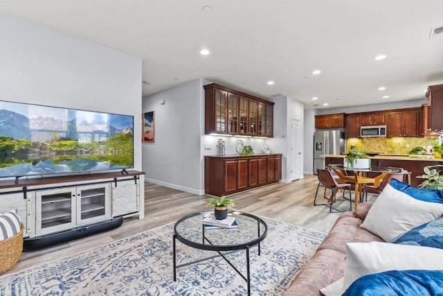 living room with light wood-type flooring