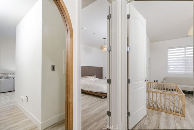 1023 Wilcox Ave Unit 102, Los Angeles, CA 90038 - hall featuring wood finished floors and arched walkways