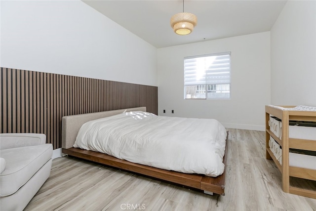 bedroom featuring light wood-type flooring