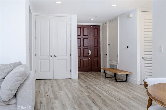 1023 Wilcox Ave Unit 102, Los Angeles, CA 90038 - foyer entrance featuring light wood-style flooring and recessed lighting