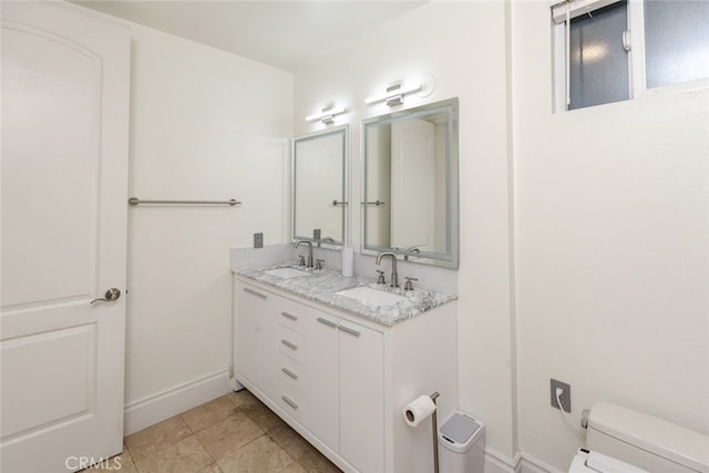 1023 Wilcox Ave Unit 102, Los Angeles, CA 90038 - bathroom with double vanity and tile patterned flooring