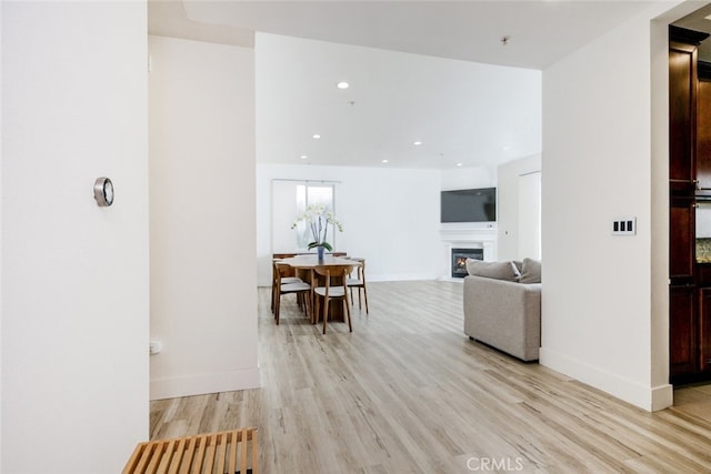 unfurnished living room featuring light hardwood / wood-style flooring