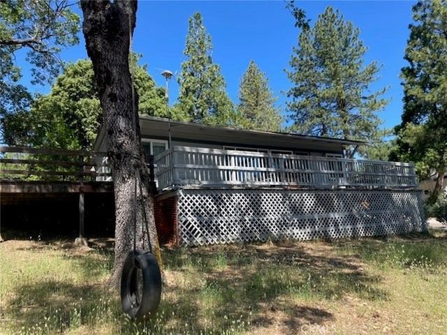 rear view of property with a deck