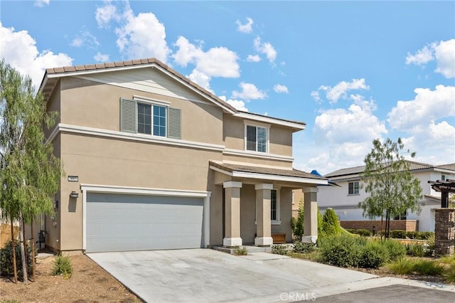 view of front of property with a garage