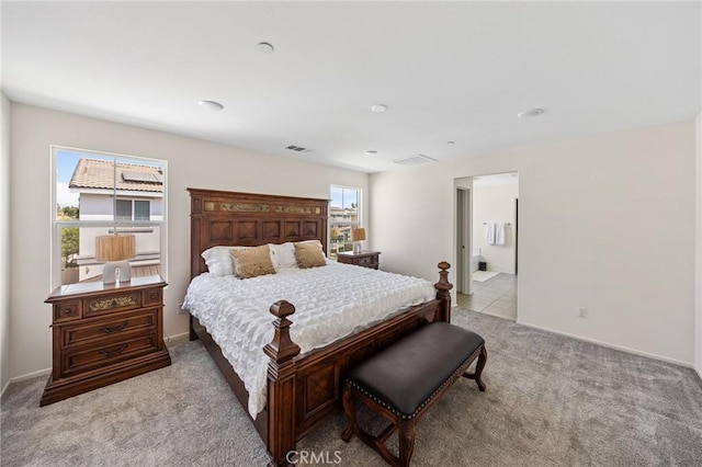 bedroom with light carpet