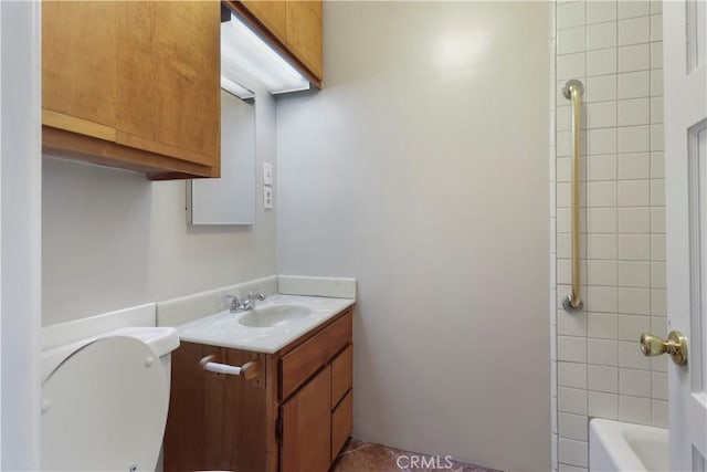 bathroom with vanity and toilet