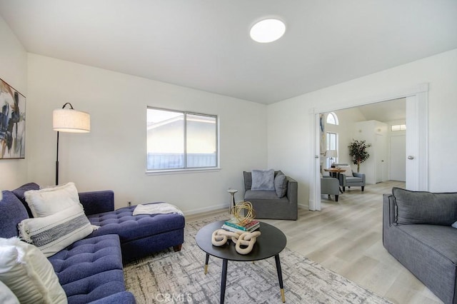 living room with light hardwood / wood-style flooring