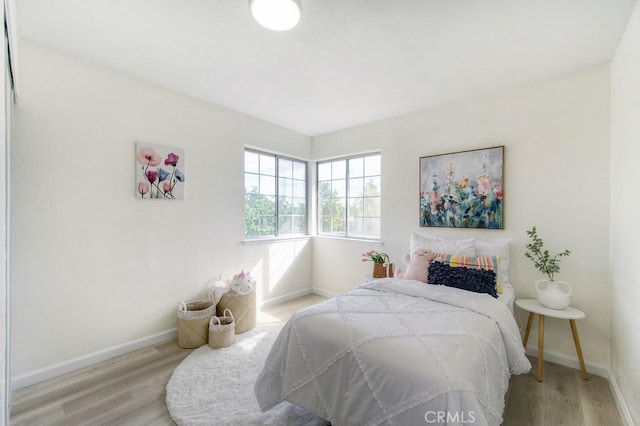 bedroom featuring light hardwood / wood-style floors