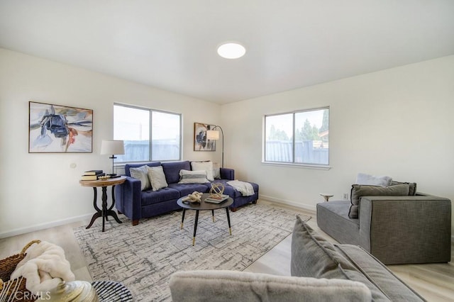 living room with light hardwood / wood-style floors