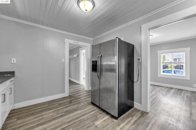 kitchen featuring hardwood / wood-style floors, white cabinetry, crown molding, wood ceiling, and stainless steel refrigerator with ice dispenser