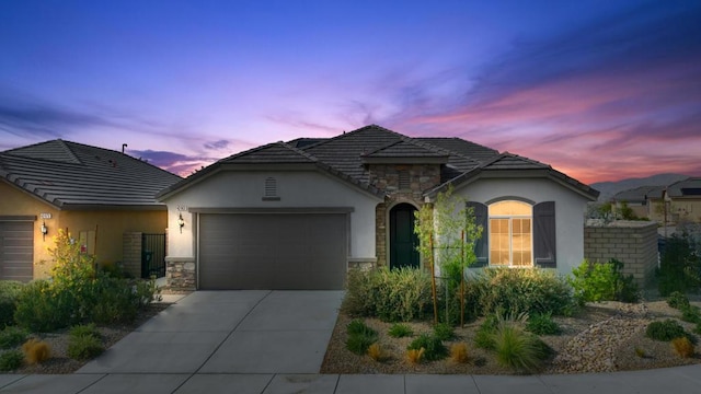 view of front of property featuring a garage