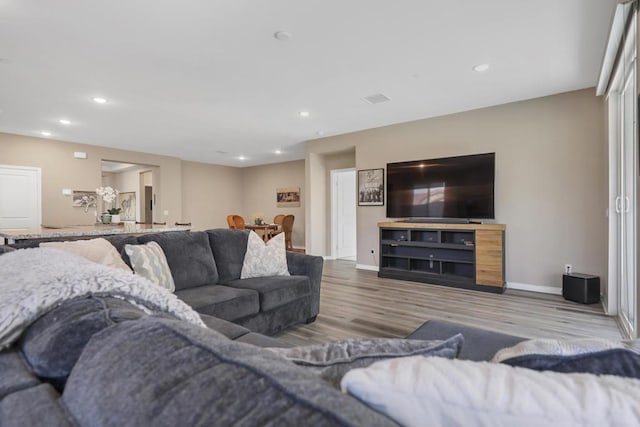 living room with hardwood / wood-style flooring