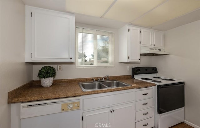 kitchen with sink, white cabinets, and white appliances