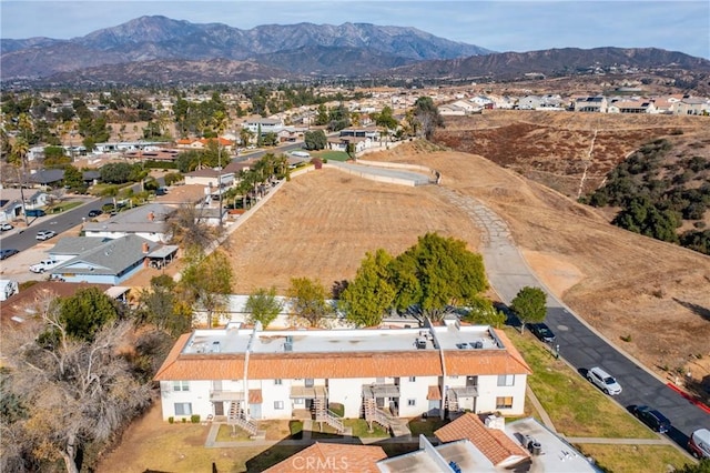 drone / aerial view featuring a mountain view