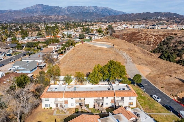 35172 Mesa Grande Dr, Calimesa, CA 92320 - aerial view of property and surrounding area featuring mountains and nearby suburban area