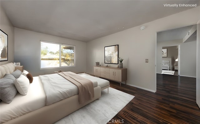 bedroom featuring dark hardwood / wood-style flooring