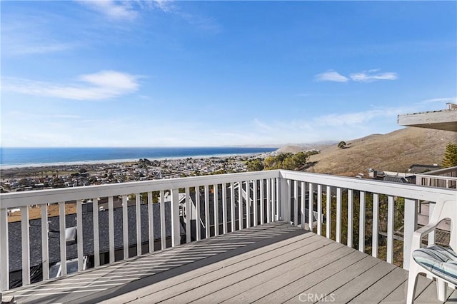 wooden terrace with a water view