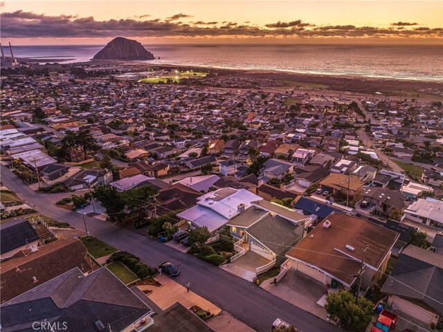 bird's eye view with a water view and a residential view