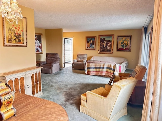 carpeted living room with a textured ceiling