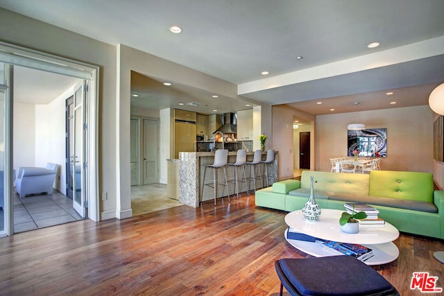 living room with light hardwood / wood-style floors