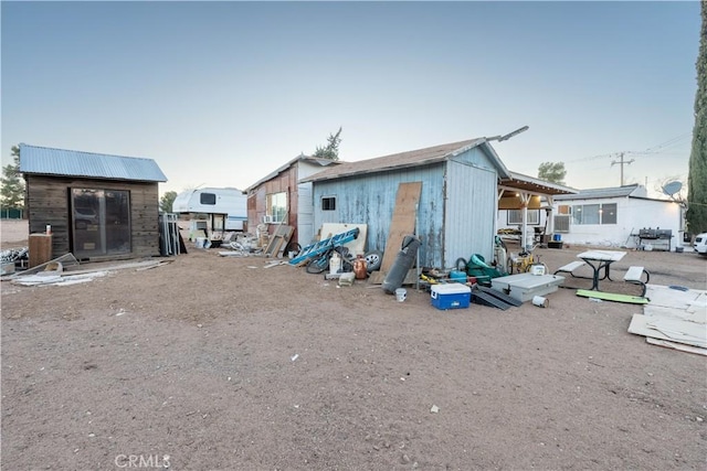 8079 White Rd, Phelan, CA 92371 - back of house with an outdoor structure