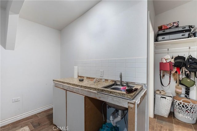 kitchen with sink and backsplash