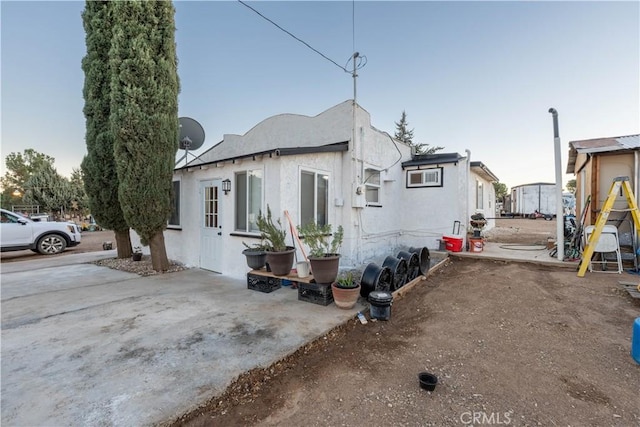 view of home's exterior with a patio area