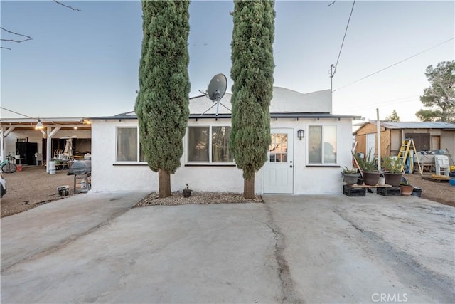 view of front of house featuring a patio