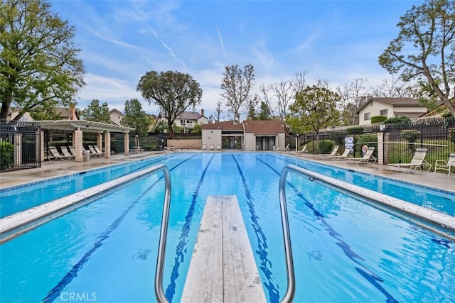 view of swimming pool featuring a patio area