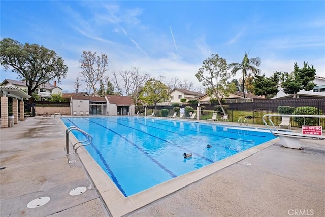 view of swimming pool featuring a patio