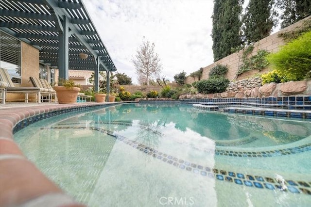 view of pool with a pergola