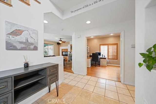 interior space featuring a healthy amount of sunlight and light tile patterned floors