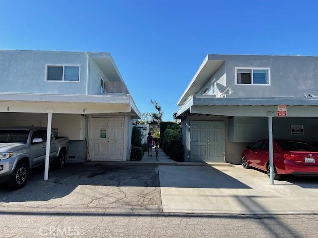 view of home's exterior featuring a carport